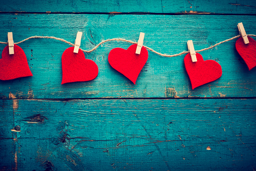 Valentines day hearts on wooden background
